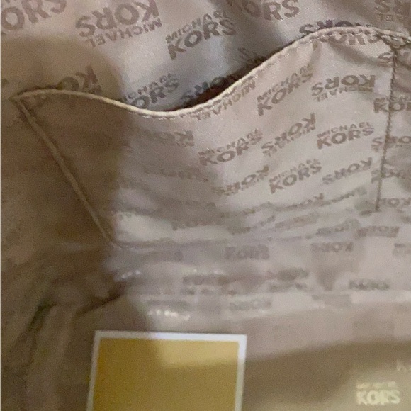 Michael Kors cherry red purse. VGUC, multiple pockets to neatly carry items. - Picture 8 of 13